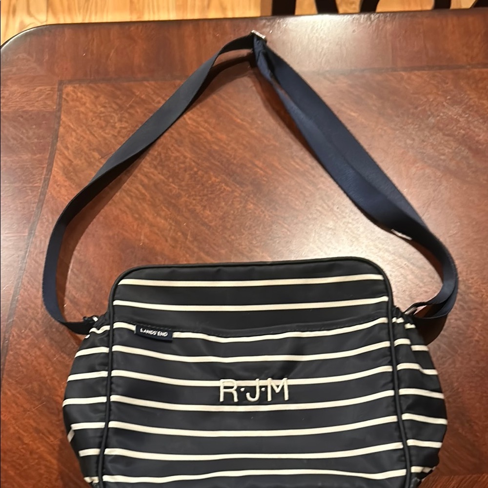 Lands End Navy and White striped Diaper bag with coordinating changing pad.